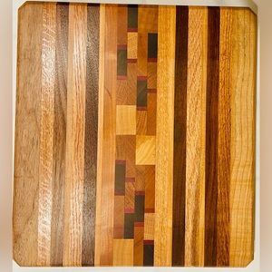 Custom, one of a kind cutting board. Made of Walnut, Ash, Cherry, Oak 14x13x1.5